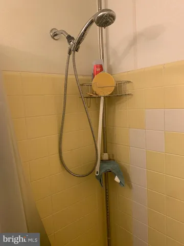 a kitchen with a stove and a refrigerator