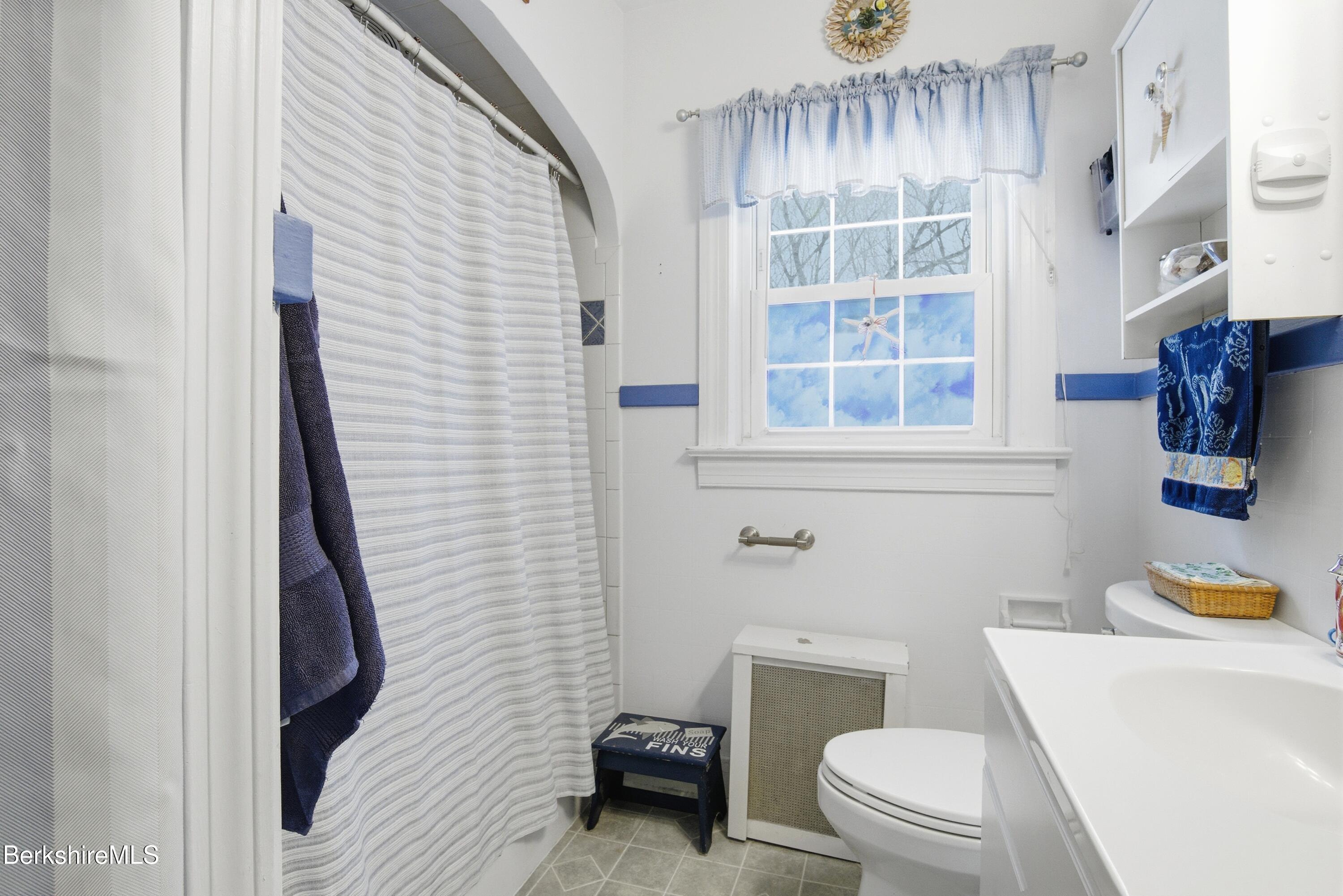 53 Edison Avenue Pittsfield, MA 01201 - Photo 26 of 45 a bathroom with a toilet and a shower