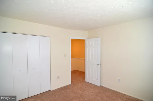 an empty room with closet