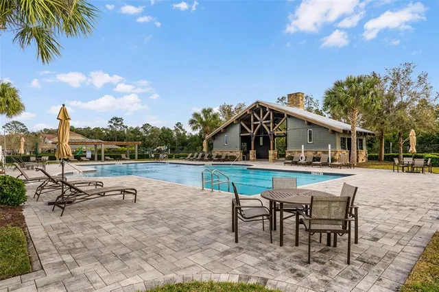 a view of a house with a swimming pool