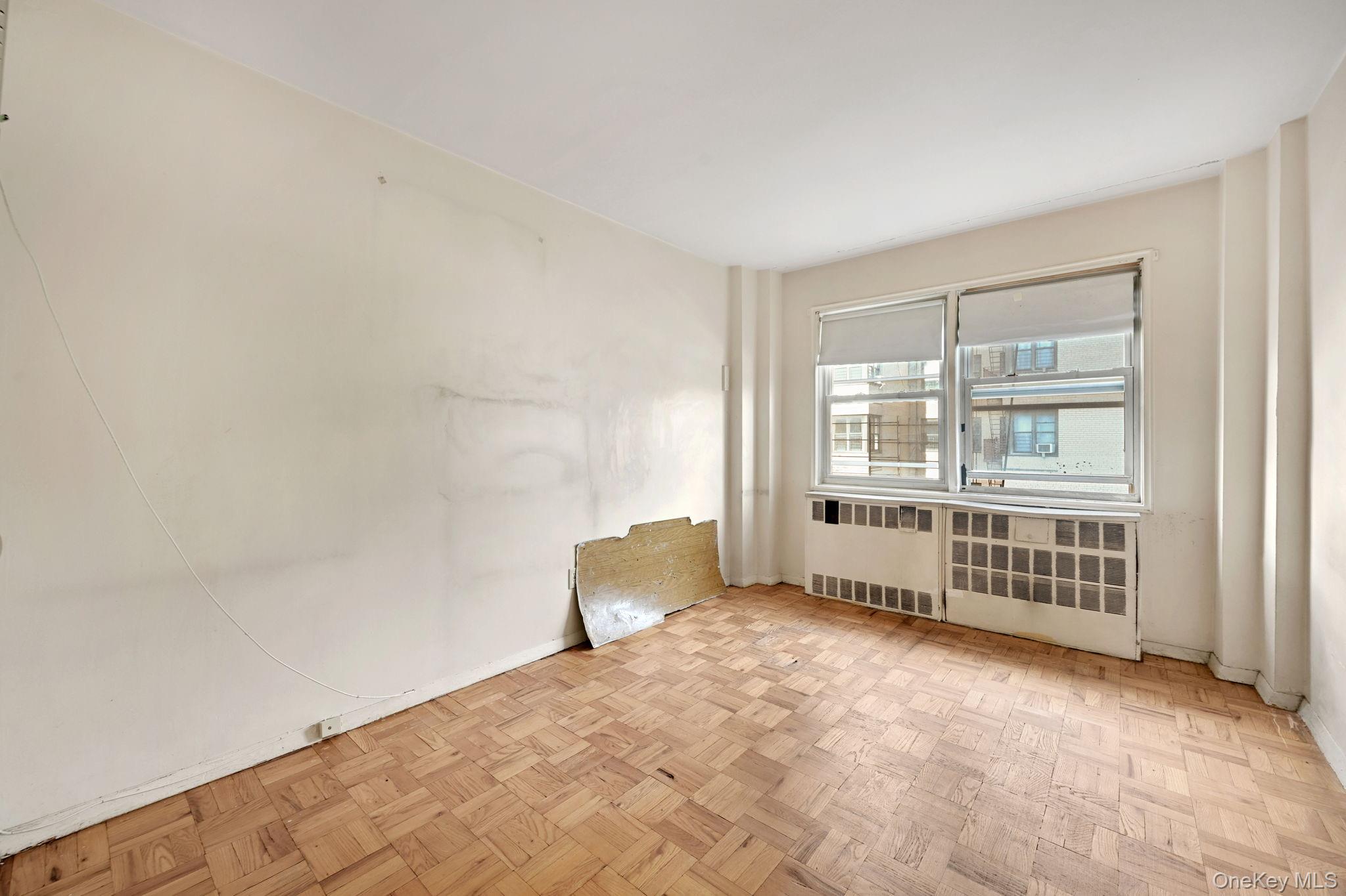 3131 Grand Concourse, Unit 3C Bronx, NY 10468 - Photo 14 of 27 a view of an empty room with a window