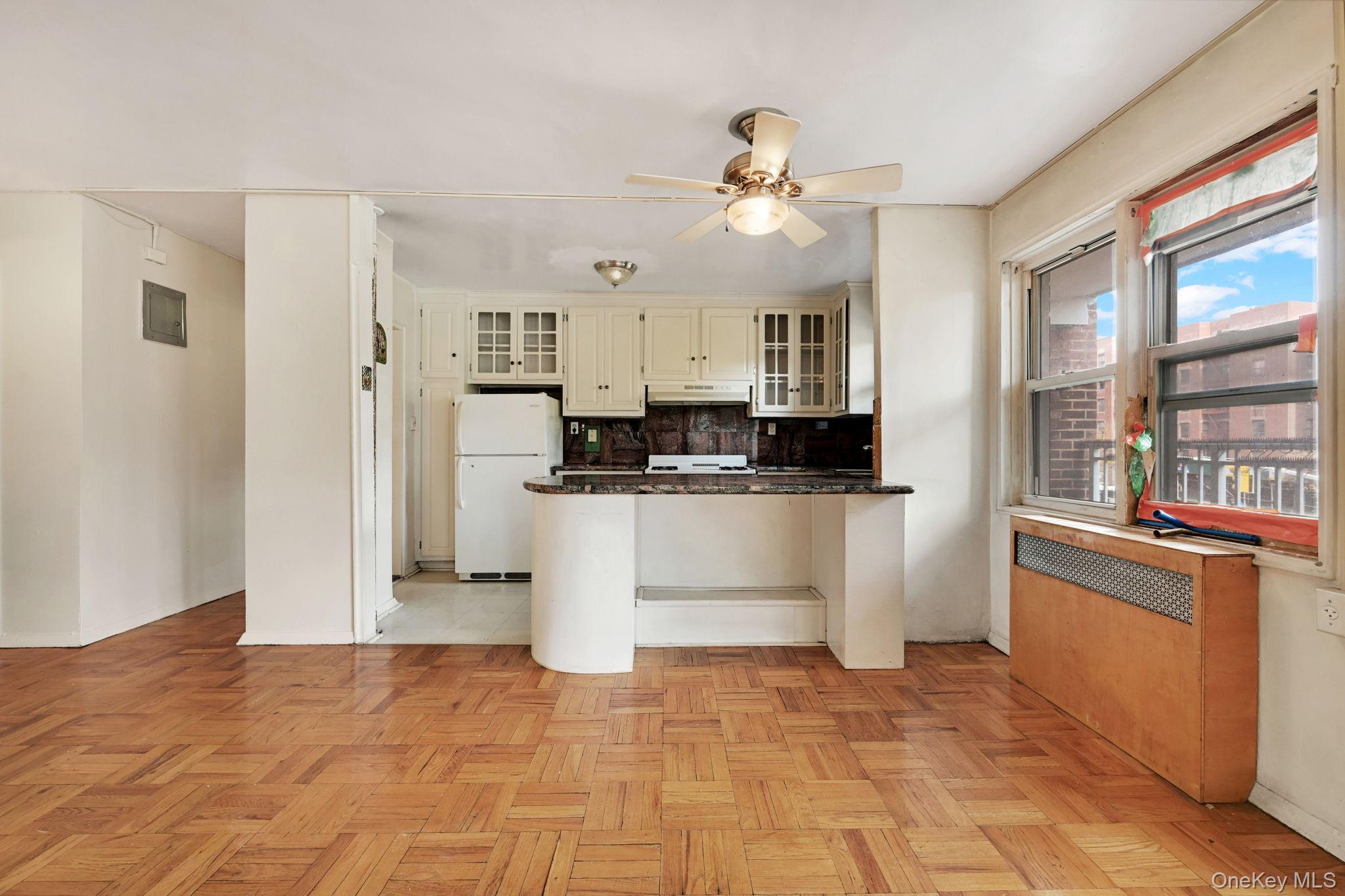 3131 Grand Concourse, Unit 3C Bronx, NY 10468 - Photo 20 of 27 a view of living room with stainless steel appliances granite countertop furniture and a window