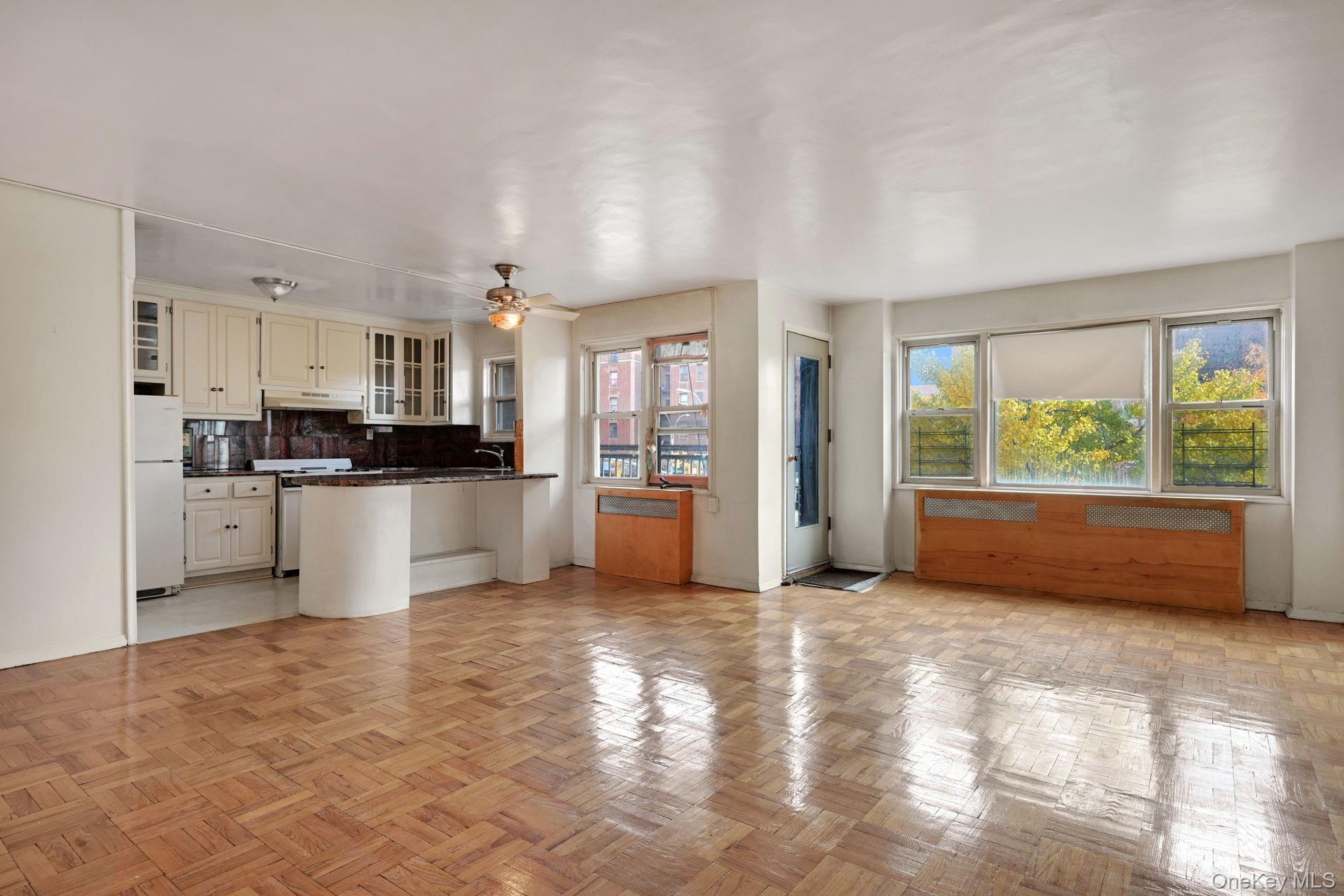 3131 Grand Concourse, Unit 3C Bronx, NY 10468 - Photo 26 of 27 a view of kitchen with stainless steel appliances granite countertop a stove and a refrigerator