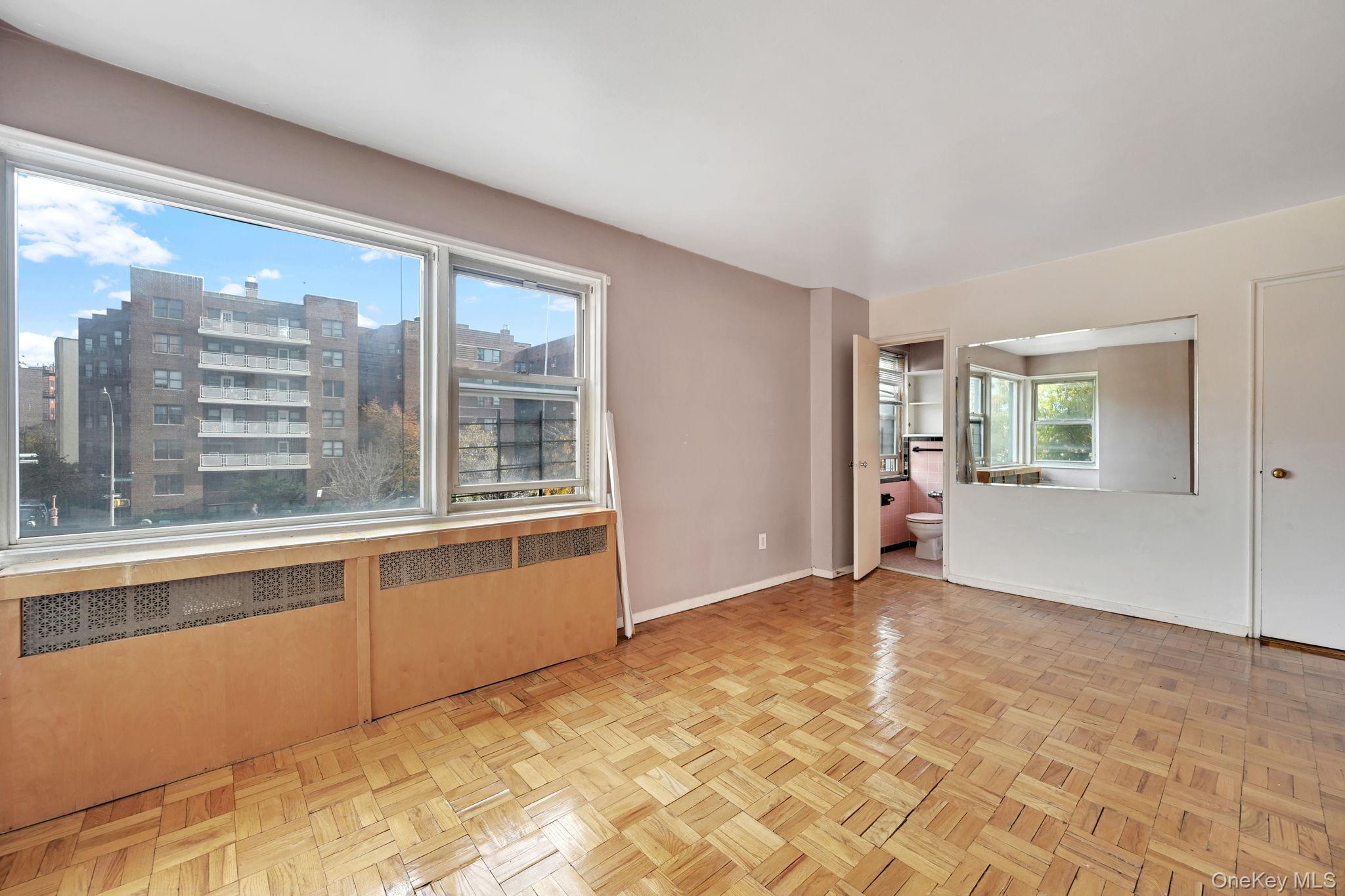 3131 Grand Concourse, Unit 3C Bronx, NY 10468 - Photo 7 of 27 a view of an empty room with a window