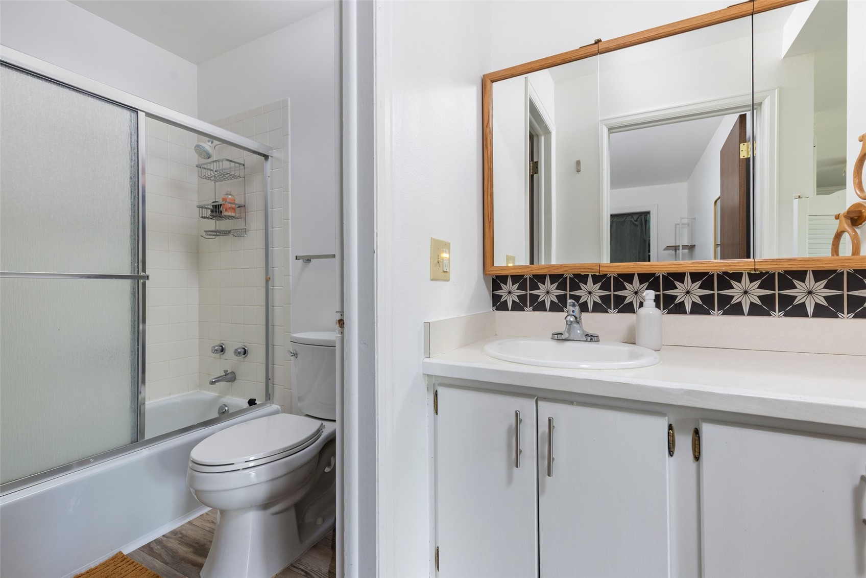 180 Evergreen Road, Unit 105 Dillon, CO 80435 - Photo 13 of 24 a bathroom with a sink a toilet and shower