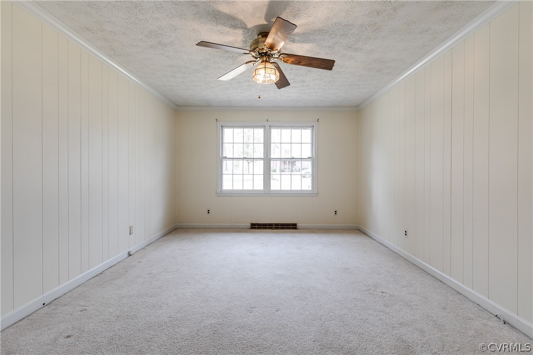 4025 Hidden Valley Road Chester, VA 23831 - Photo 12 of 23 an empty room with windows and fan