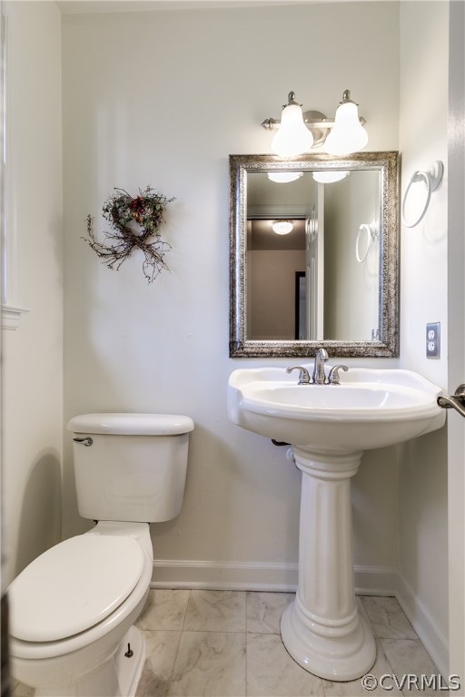 4025 Hidden Valley Road Chester, VA 23831 - Photo 13 of 23 a bathroom with a toilet sink and mirror
