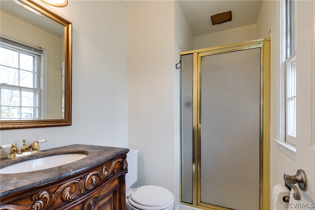 4025 Hidden Valley Road Chester, VA 23831 - Photo 17 of 23 a bathroom with a granite countertop sink toilet and mirror