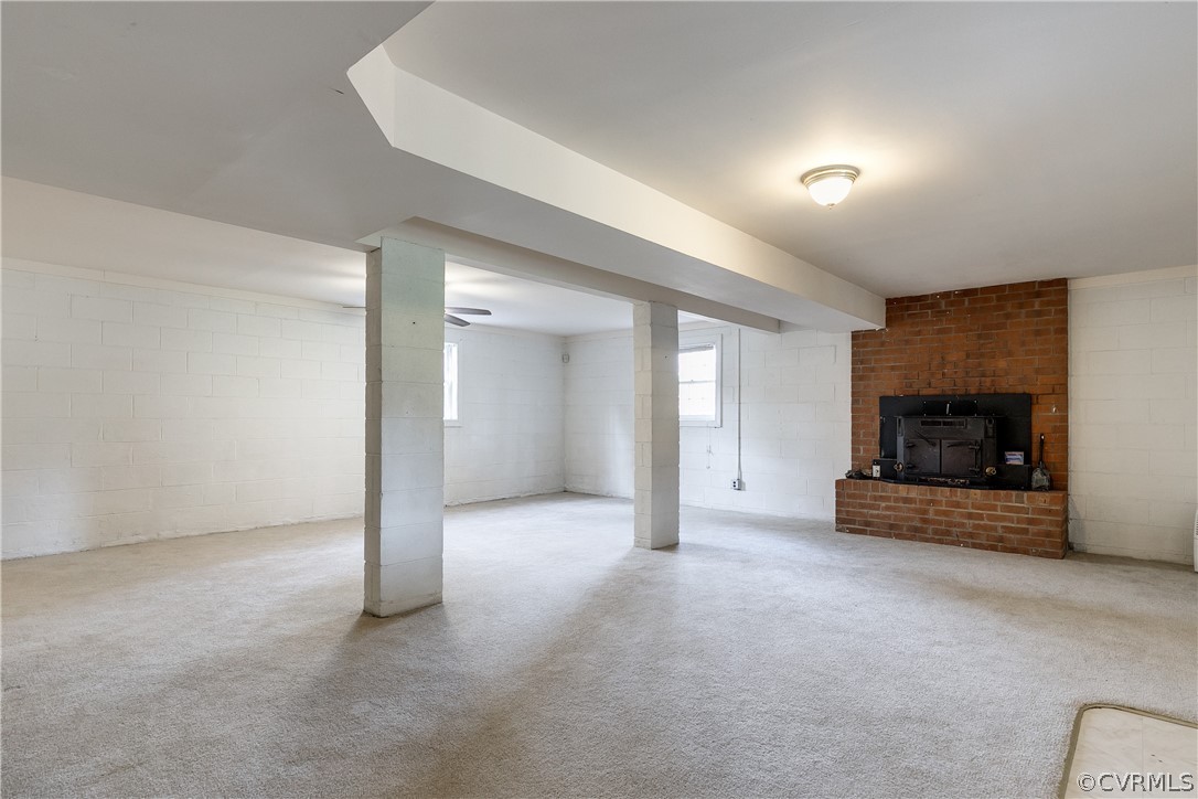 4025 Hidden Valley Road Chester, VA 23831 - Photo 18 of 23 an empty room with a fireplace and a fan