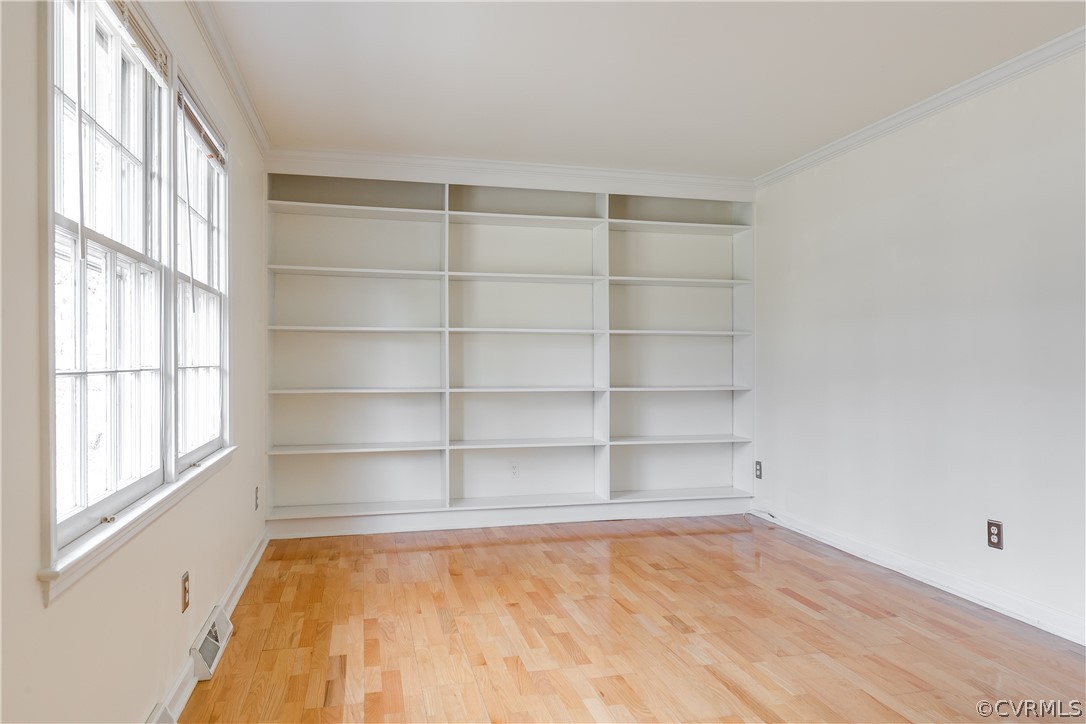 4025 Hidden Valley Road Chester, VA 23831 - Photo 4 of 23 a view of a room with empty racks on the wall