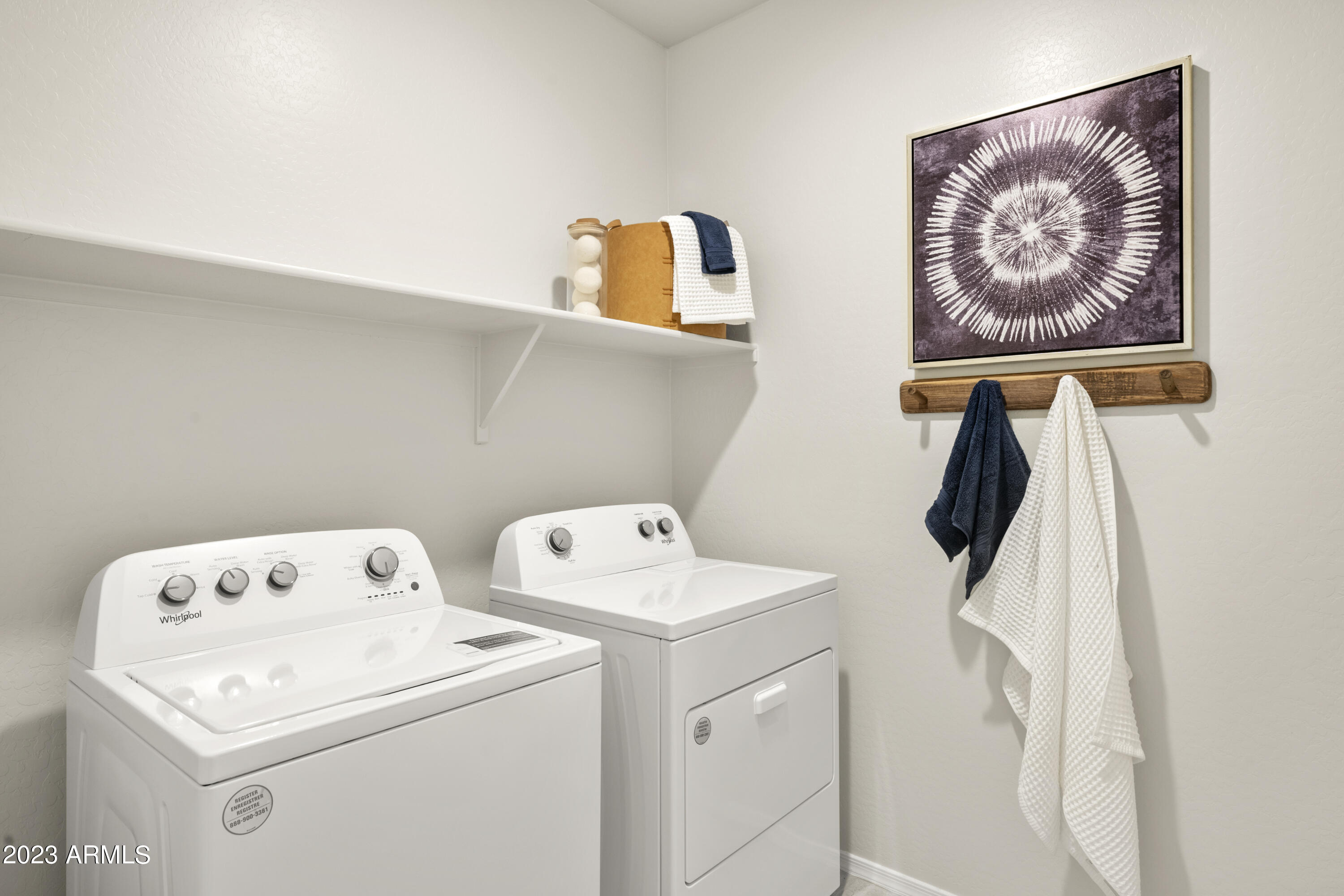 2374 West Solstice Avenue Apache Junction, AZ 85120 - Photo 28 of 59 a utility room with dryer and washer