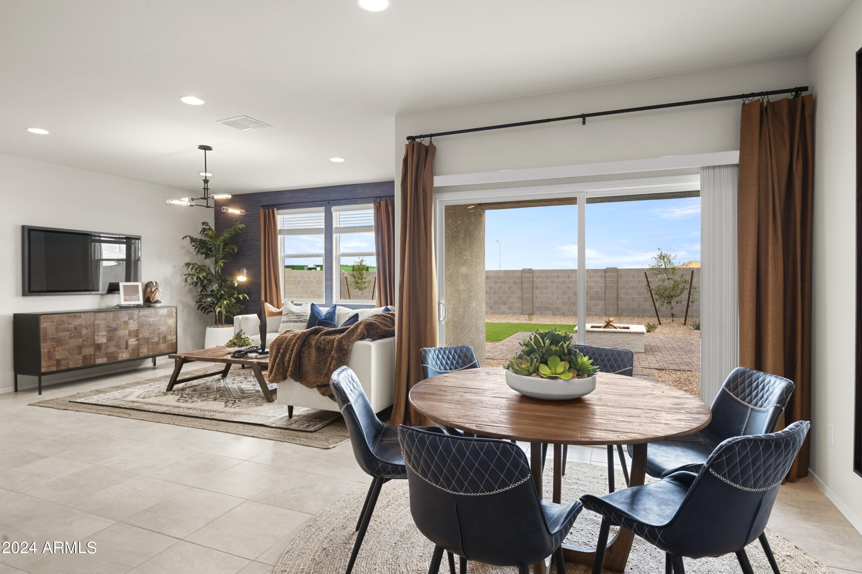 2374 West Solstice Avenue Apache Junction, AZ 85120 - Photo 43 of 59 a dining room with furniture window and wooden floor