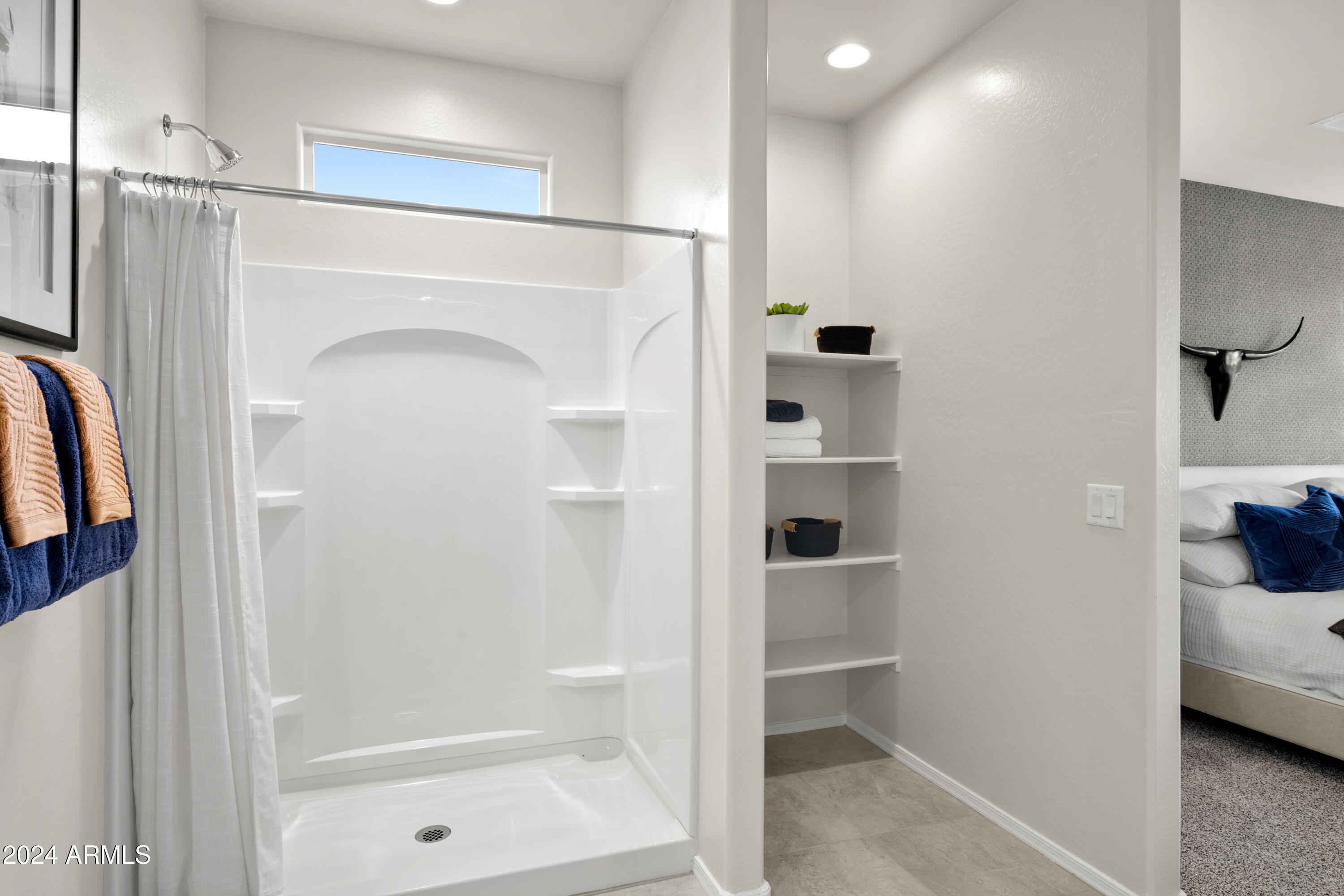 2374 West Solstice Avenue Apache Junction, AZ 85120 - Photo 53 of 59 a bathroom with a shower and a tub