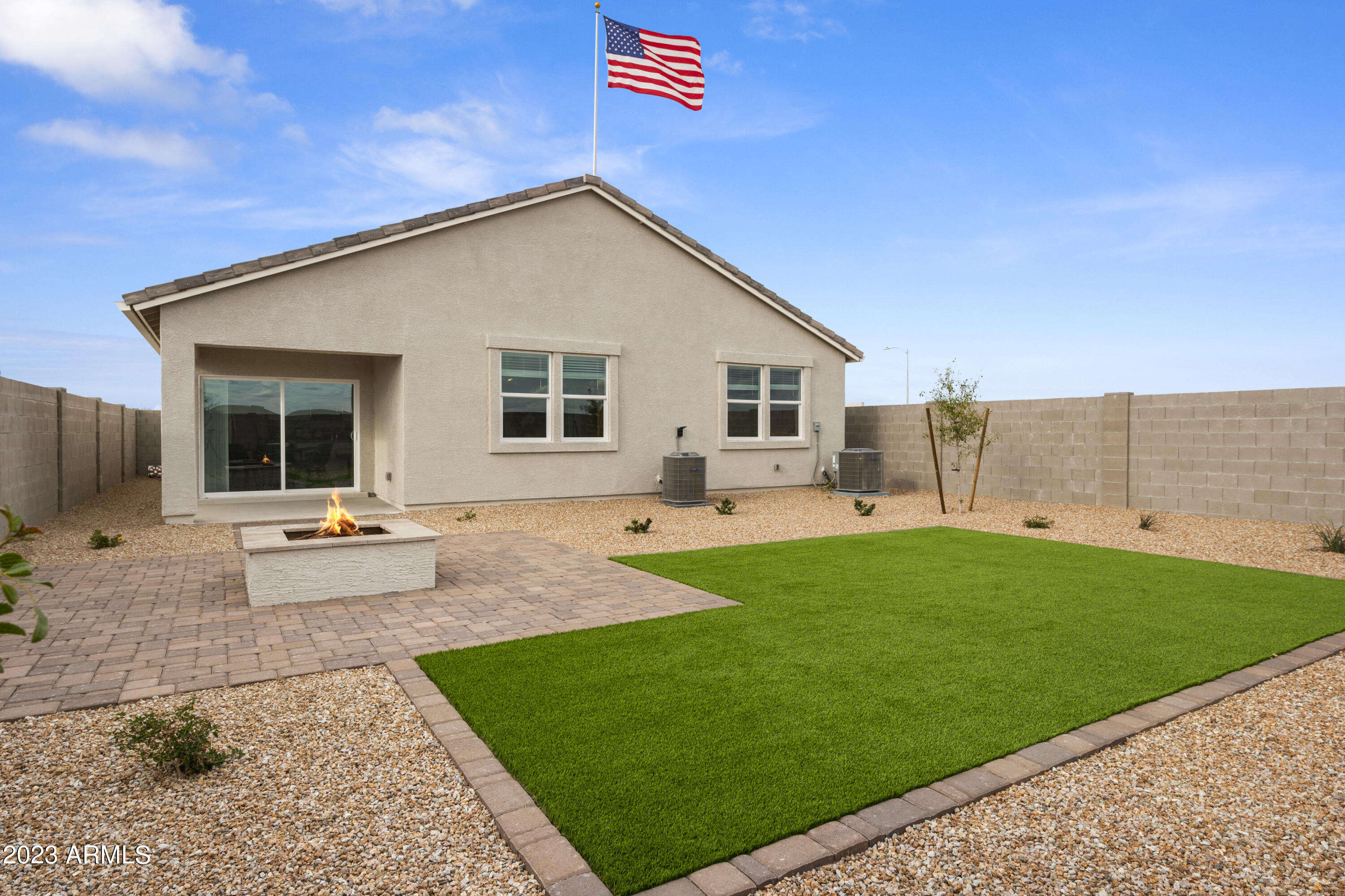 2374 West Solstice Avenue Apache Junction, AZ 85120 - Photo 8 of 59 a view of a house with backyard and sitting area