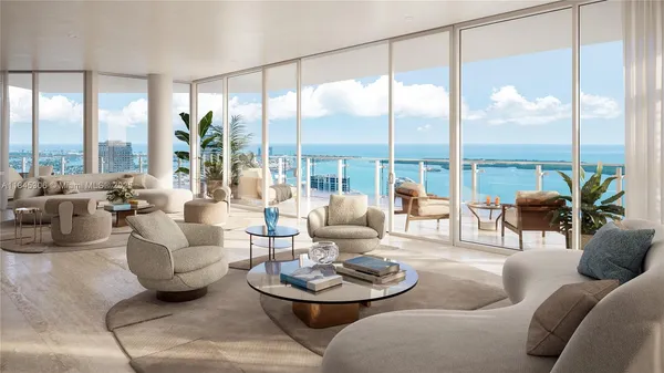 a living room with furniture and a large window with garden view