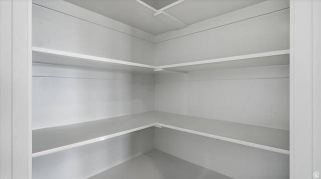 2038 East Ranch Road Eagle Mountain, UT 84005 - Photo 13 of 66 Interior closet featuring multiple white painted shelves