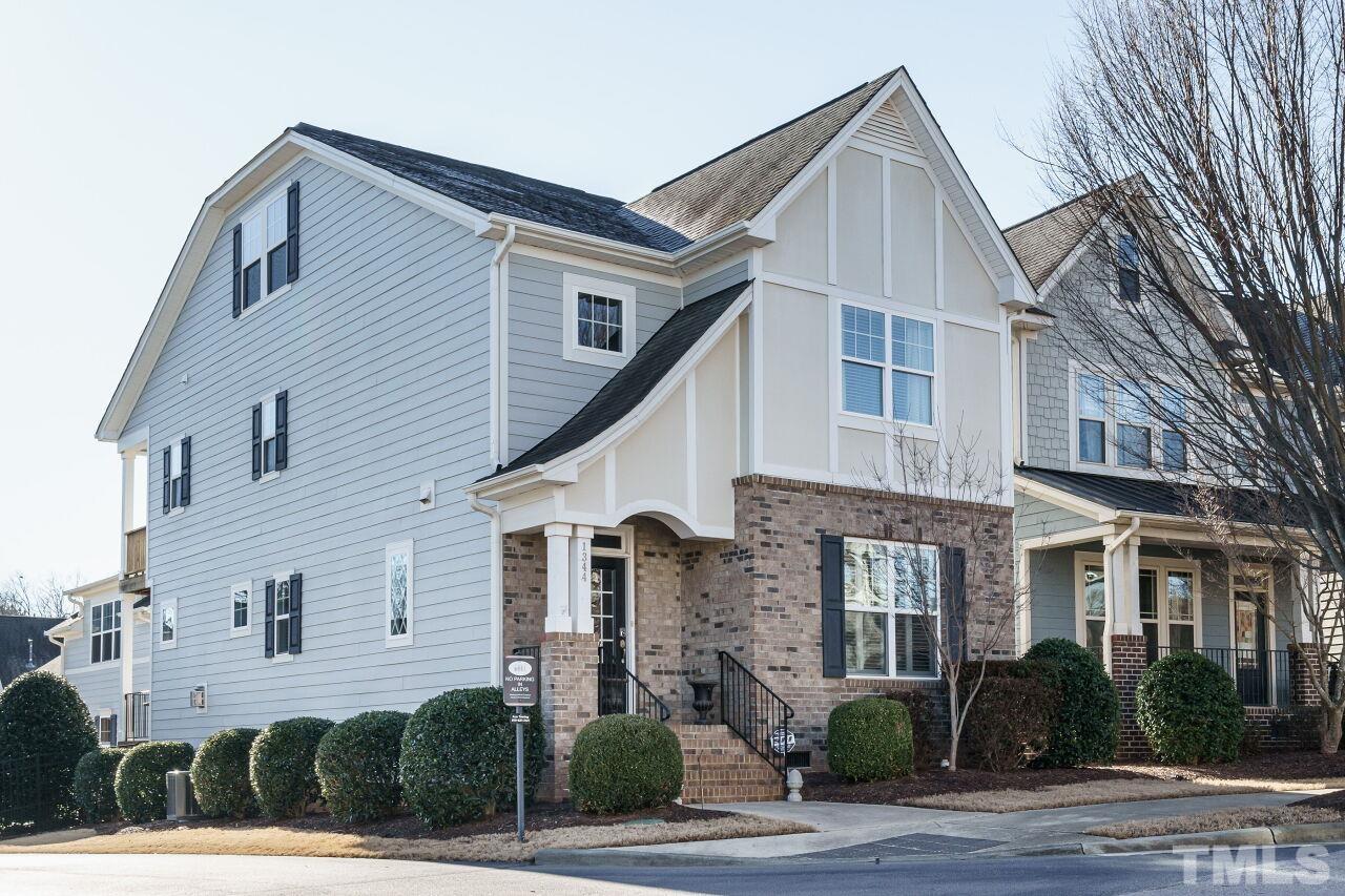 1344 Rodessa Run Raleigh, NC 27607 - Photo 1 of 38 a front view of a house with a yard