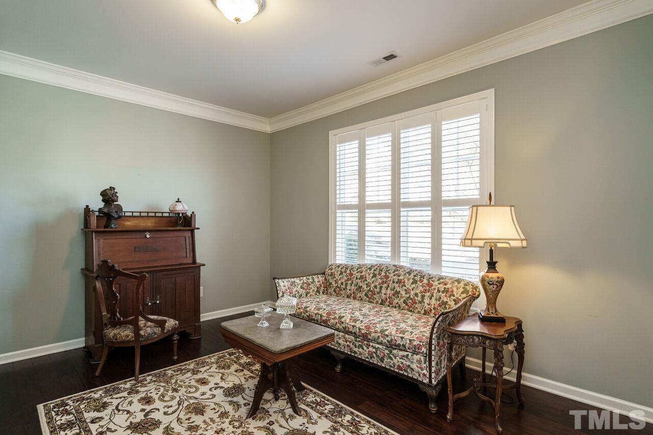 1344 Rodessa Run Raleigh, NC 27607 - Photo 6 of 38 a bedroom with a bed and a window