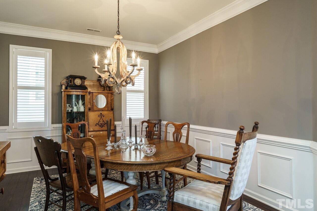 1344 Rodessa Run Raleigh, NC 27607 - Photo 9 of 38 a view of a dining room with furniture and window