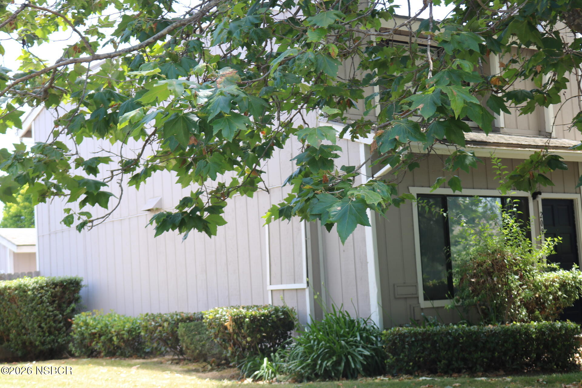 208 North R Street Lompoc, CA 93436 - Photo 3 of 22 a house view with a garden space