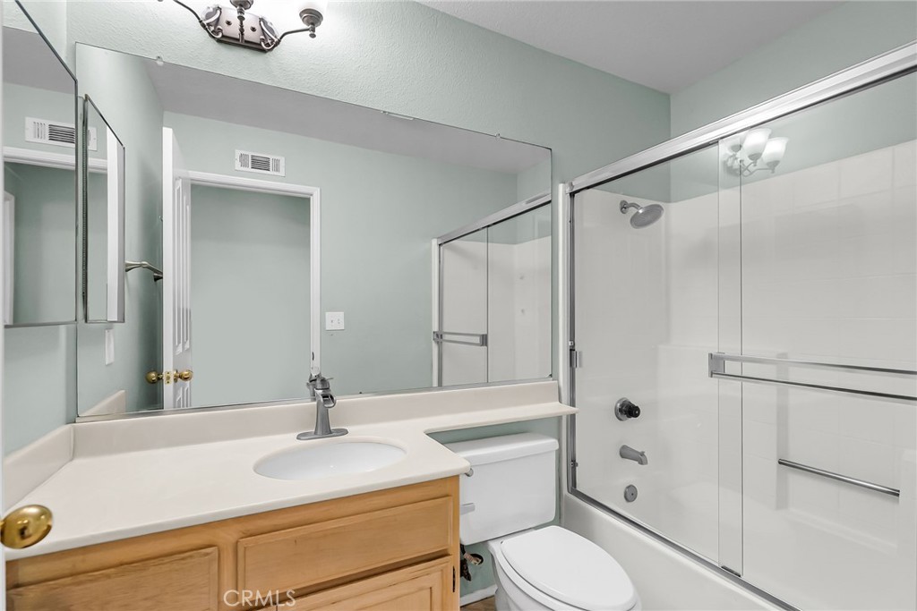 1011 Cannon Road Riverside, CA 92506 - Photo 30 of 46 a bathroom with a sink toilet and shower