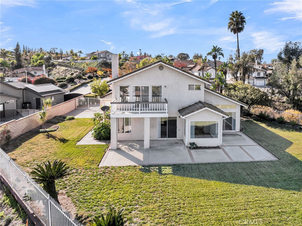 1011 Cannon Road Riverside, CA 92506 - Photo 40 of 46 a view of a house with pool and lawn chairs