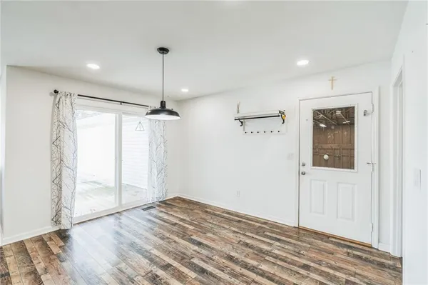 a utility room with a sink washer and dryer