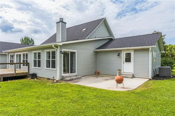 a kitchen with stainless steel appliances granite countertop a stove and a sink