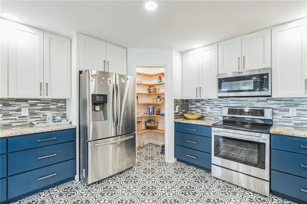 a living room with furniture fireplace and a flat screen tv