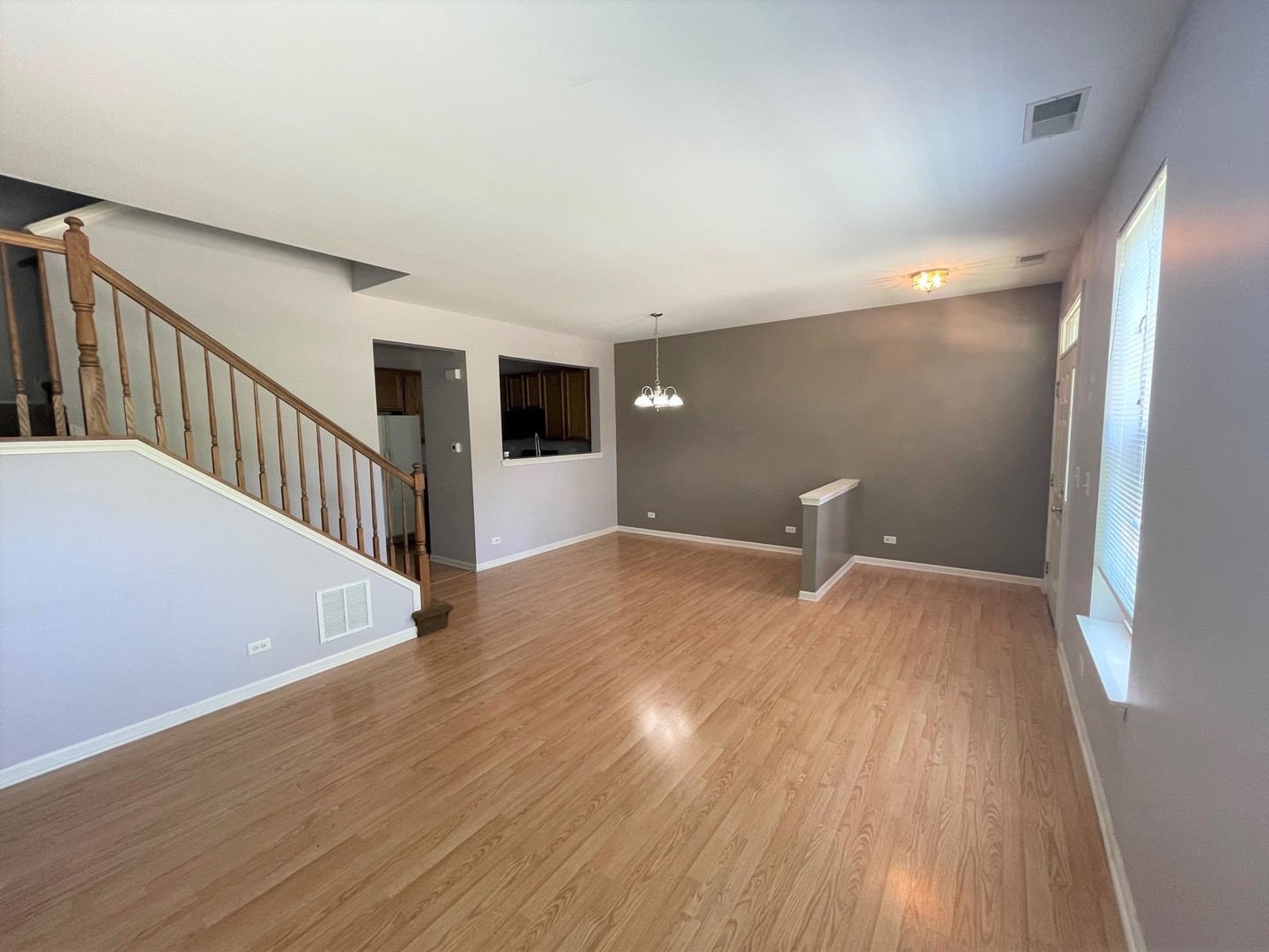 2463 Georgetown Circle Aurora, IL 60503 - Photo 2 of 21 a view of a livingroom with wooden floor