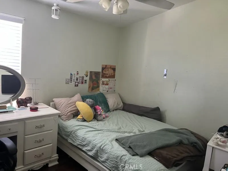 1616 South Euclid Street, Unit 54 Anaheim, CA 92802 - Photo 11 of 11 a bedroom with a bed and a window