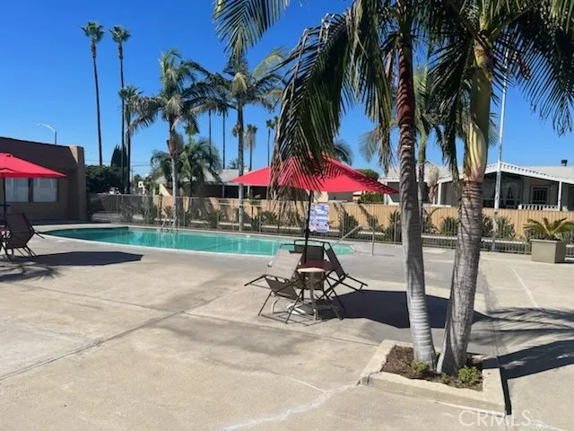 1616 South Euclid Street, Unit 54 Anaheim, CA 92802 - Photo 5 of 11 a view of bike storage with palm trees