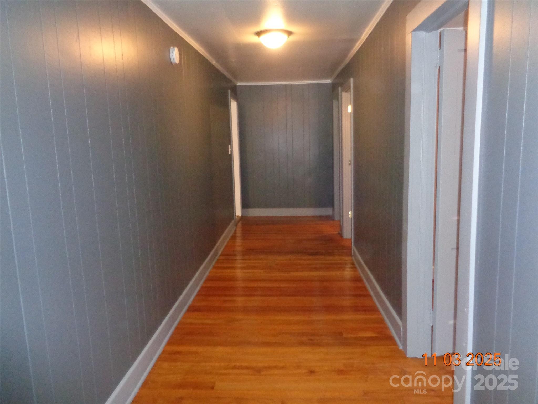 1412 Walt Arney Road Lenoir, NC 28645 - Photo 13 of 20 a view of hallway with wooden floor