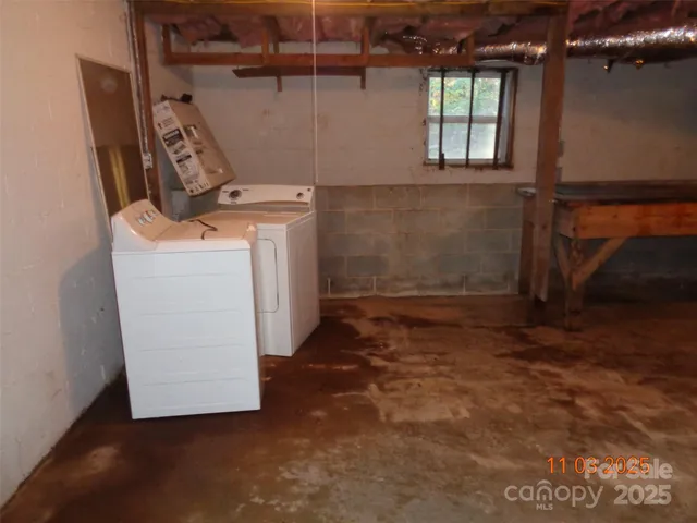a view of a storage & utility room with a sink