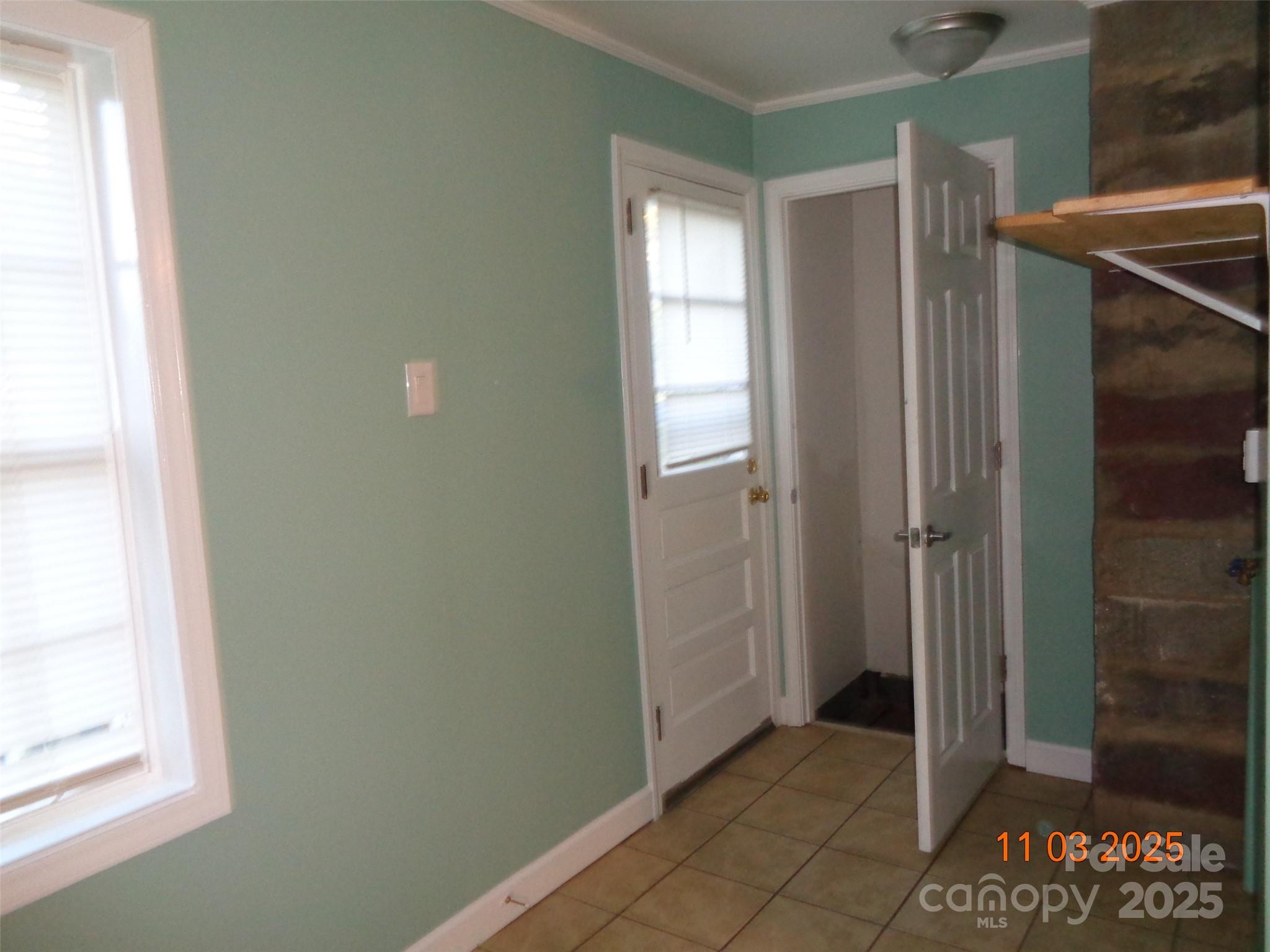 1412 Walt Arney Road Lenoir, NC 28645 - Photo 5 of 20 an empty room with windows