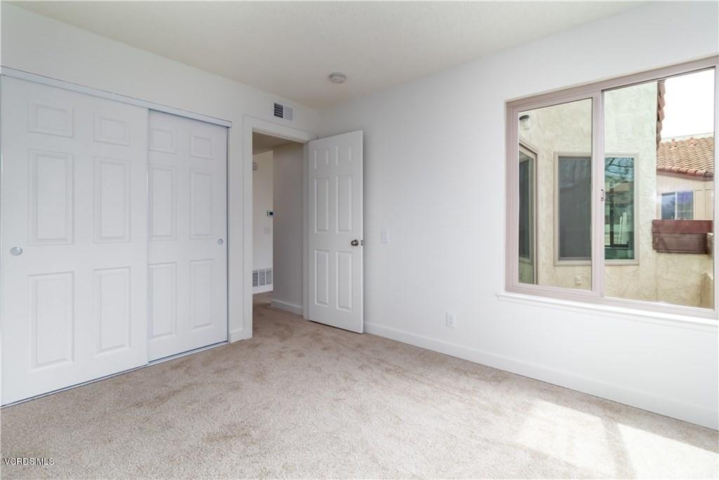 1718 Sinaloa Road, Unit 216 Simi Valley, CA 93065 - Photo 14 of 24 a view of an empty room with a window