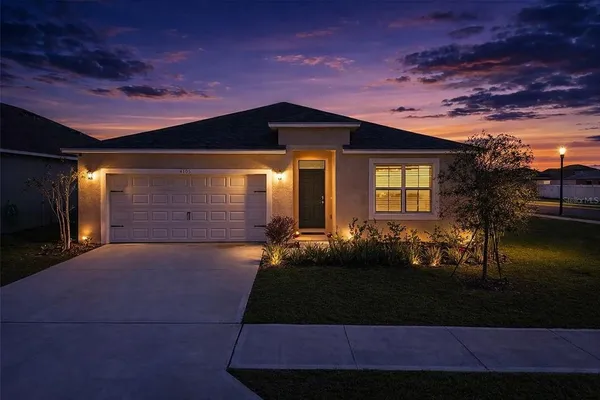 a front view of house with yard