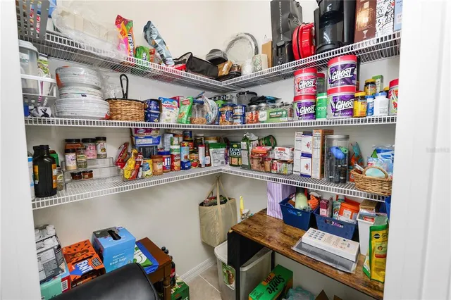 a room with furniture and a book shelf
