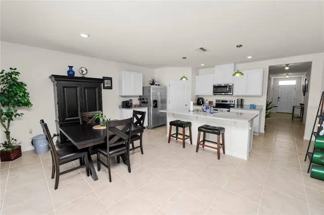 a view of a dining room with furniture