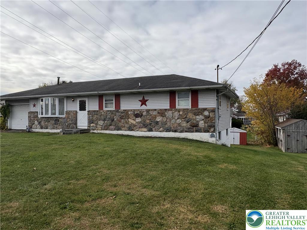 3508 Nazareth Road Easton, PA 18045 - Photo 1 of 20 a front view of a house with a garden
