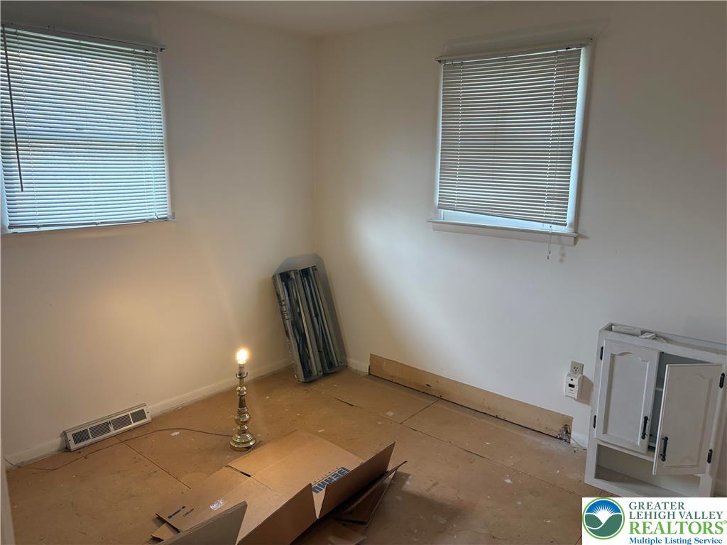 3508 Nazareth Road Easton, PA 18045 - Photo 13 of 20 a bathroom with a sink and a mirror
