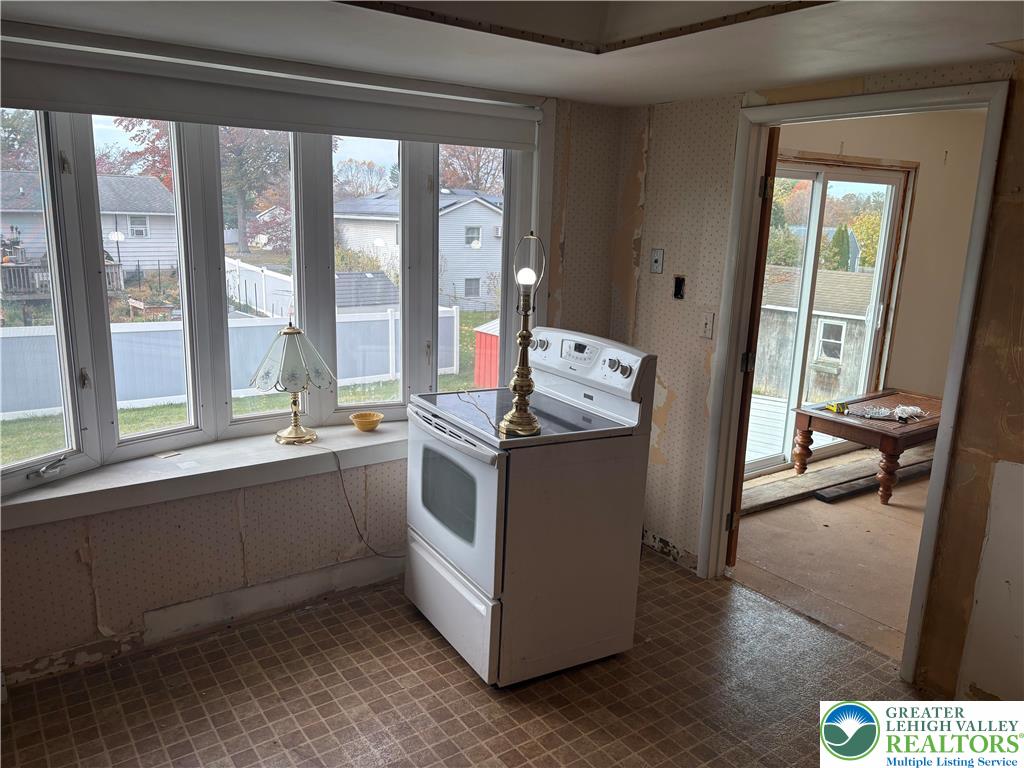 3508 Nazareth Road Easton, PA 18045 - Photo 3 of 20 a view of washer and dryer with bathroom in the background
