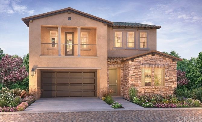 65 Rockinghorse Irvine, CA 92602 - Photo 1 of 2 a front view of a house with garden