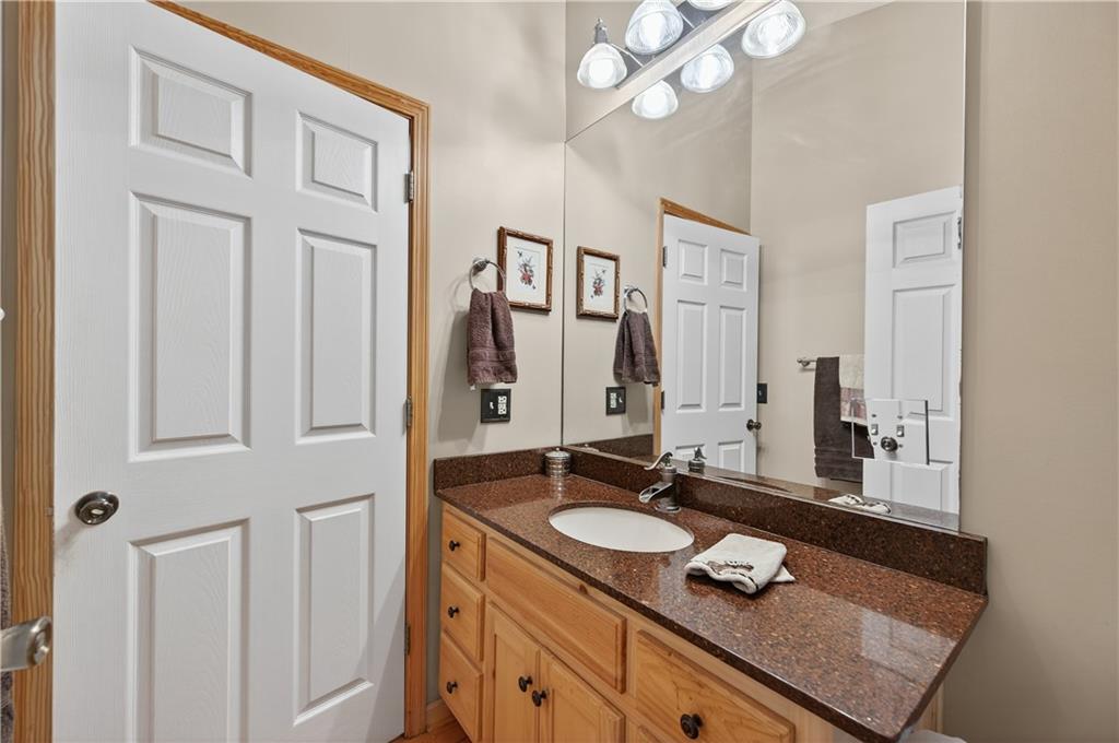 200 Bahn Innsbruck Helen, GA 30545 - Photo 24 of 84 a bathroom with a sink vanity granite and a mirror
