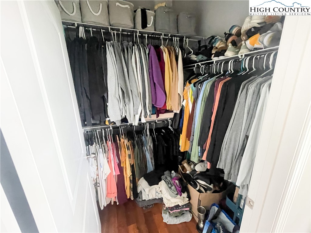 190 Eli Hartley Drive, Unit 112 Boone, NC 28607 - Photo 12 of 20 a view of walk in closet with clothes