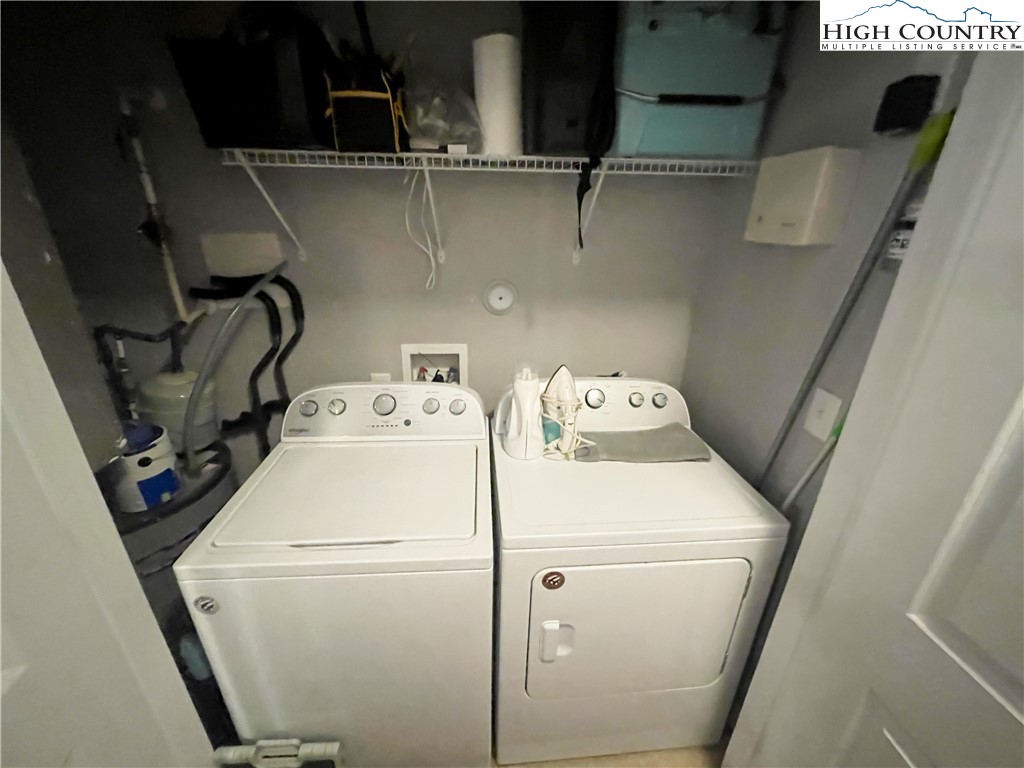 190 Eli Hartley Drive, Unit 112 Boone, NC 28607 - Photo 8 of 20 a utility room with dryer and washer