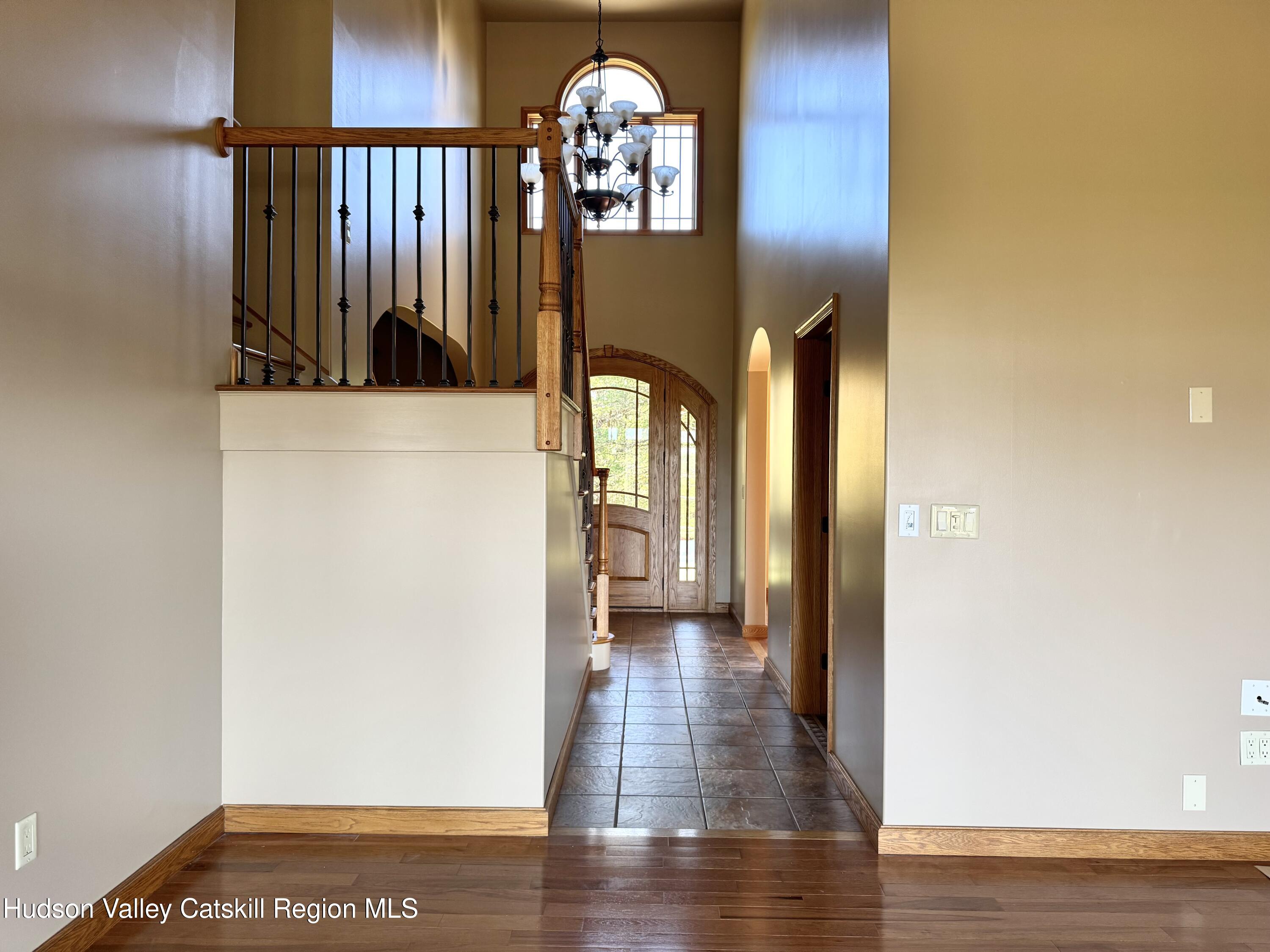 3071 Old Kings Road Catskill, NY 12414 - Photo 15 of 53 a view of a hallway with wooden floor and a potted plant