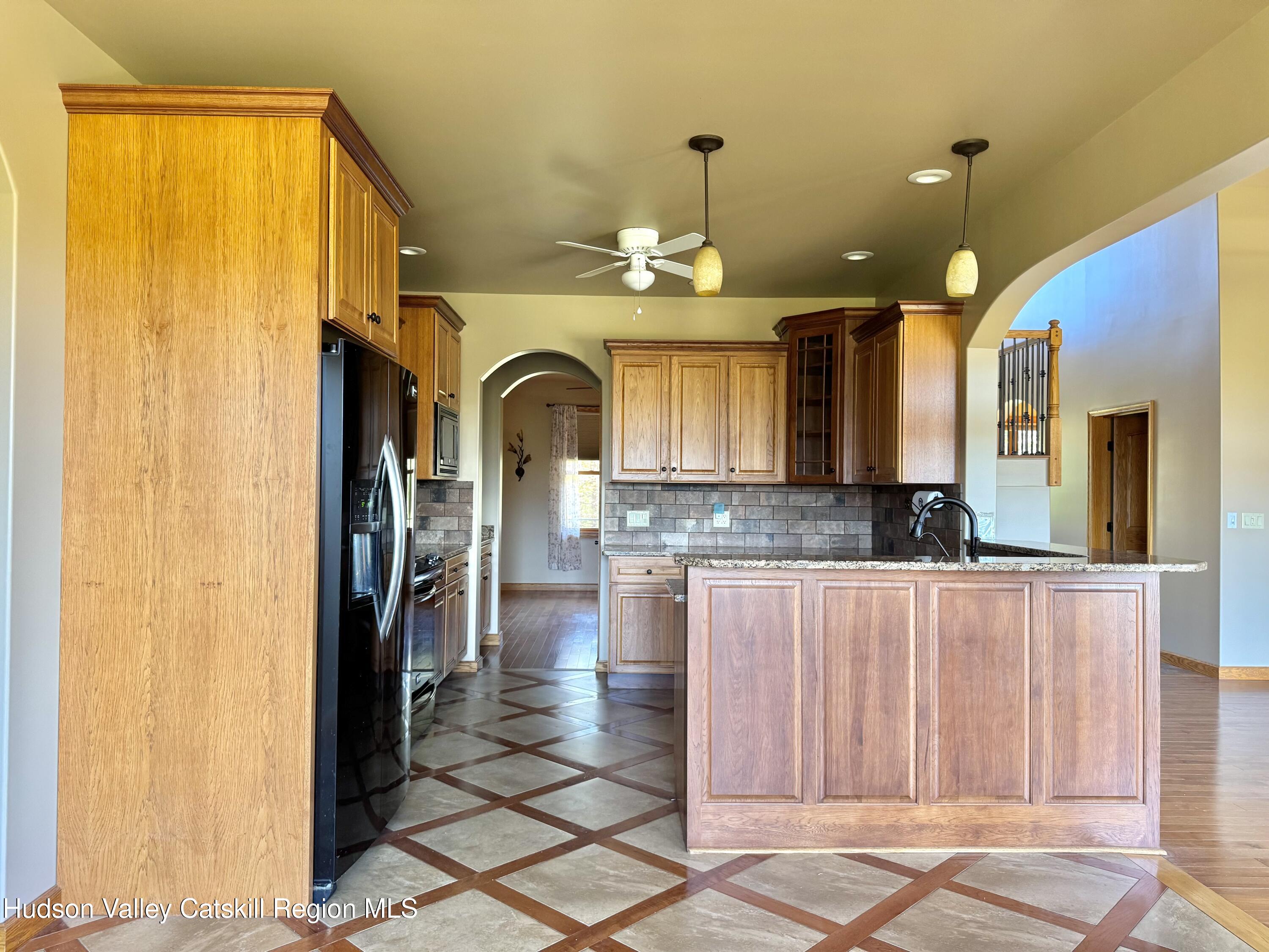 3071 Old Kings Road Catskill, NY 12414 - Photo 21 of 53 a view of a kitchen with a sink and a refrigerator