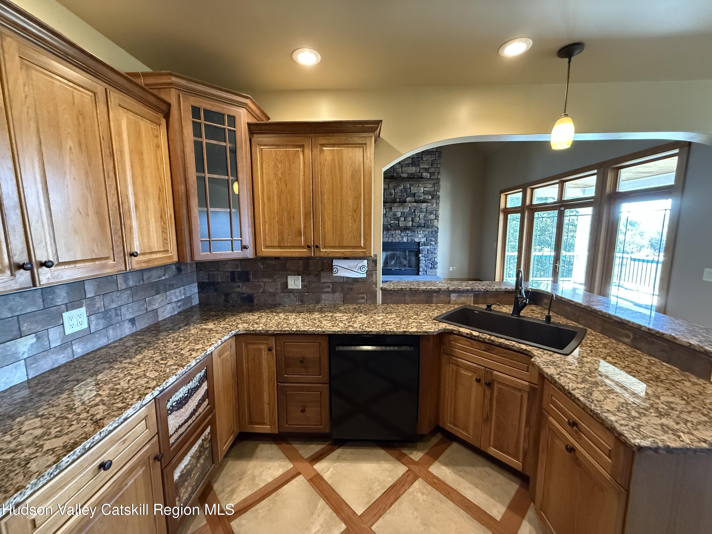 3071 Old Kings Road Catskill, NY 12414 - Photo 24 of 53 a kitchen with granite countertop a sink and a stove