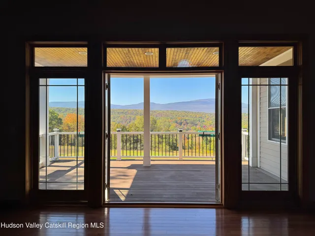 a view of a city street from a balcony